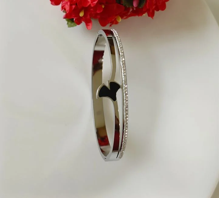 Polished Silver Bangles For A Shiny Look-Tarohi Jewels Stainless Steel Silver Plated Kada-STKD 2640