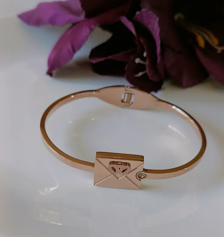 Clear Bangles For Minimalistic Style-Tarohi Jewels Stainless Steel Rosegold Plated Letter Box Kada- STKD 3051