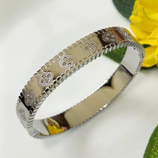 Alluring Bangles For Evening Parties-Tarohi Jewels Stainless Steel Rosegold/Silver Plated Perlee Clover Kada- STKD 2674