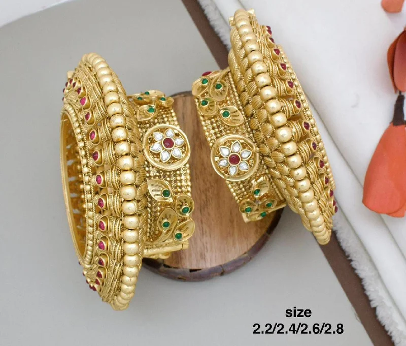 Simple Pearl Bangles For Subtle Elegance-Pooja Bangles Gold Plated Pota Stone Openable Bangle Set